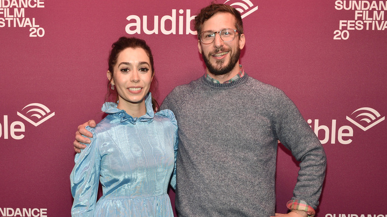 Cristin Milioti and Andy Samberg smiling at a Palm Springs premiere party