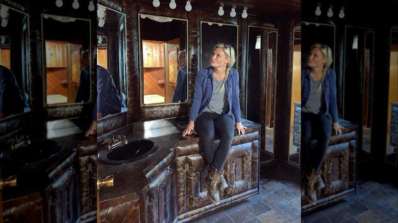 Cristy Lee sitting on a countertop