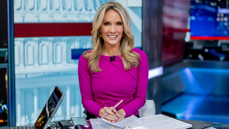 Dana Perino smiling in a news studio