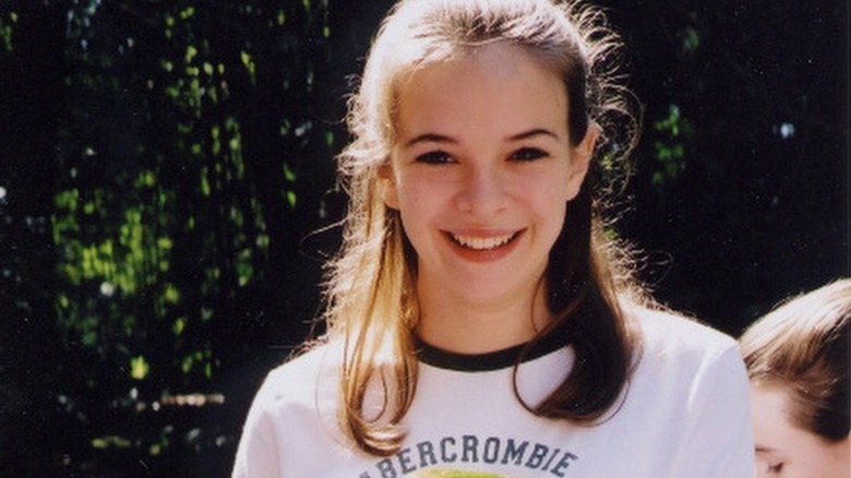 Danielle Panabaker as a teenager smiling