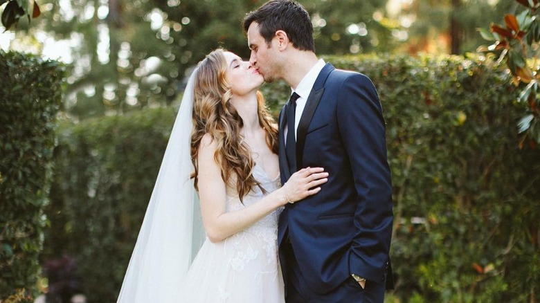 Danielle Panabaker and Hayes Robbins kissing