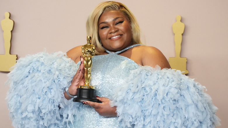 Da'Vine Joy Randolph posing with her Oscar 