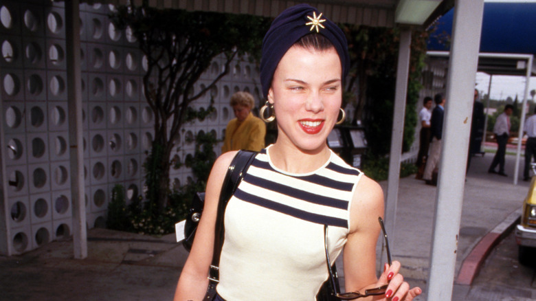 Debi Mazar wearing a turban in the 1990s