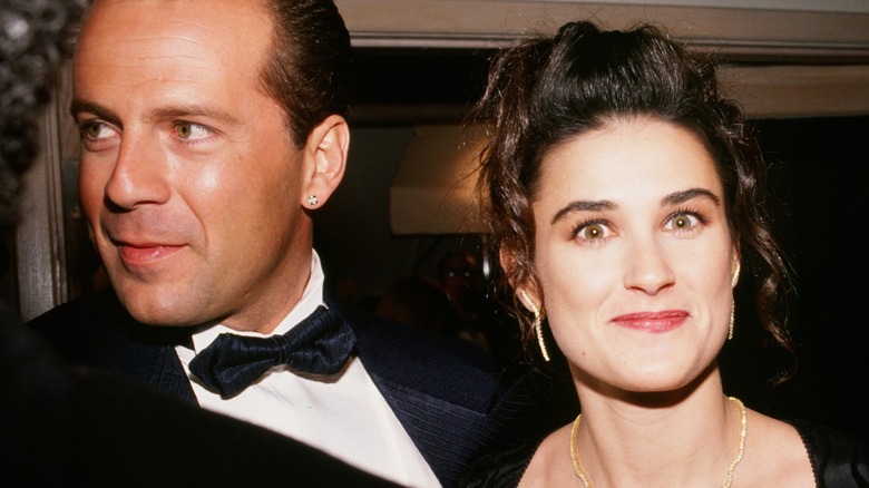 Bruce Willis in a tux and Demi Moore