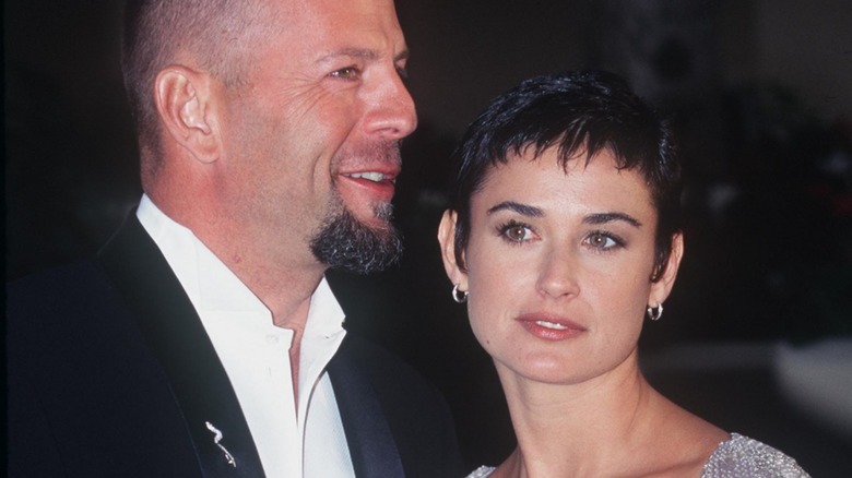 Bruce Willis and an uncomfortable-looking Demi Moore