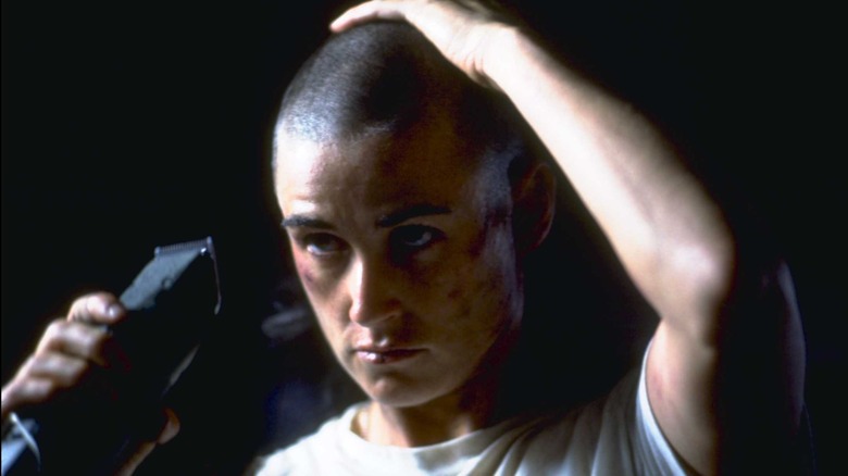 Demi Moore shaving her head in GI Jane