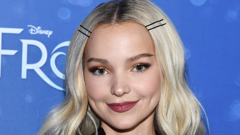 Dove Cameron with blue background