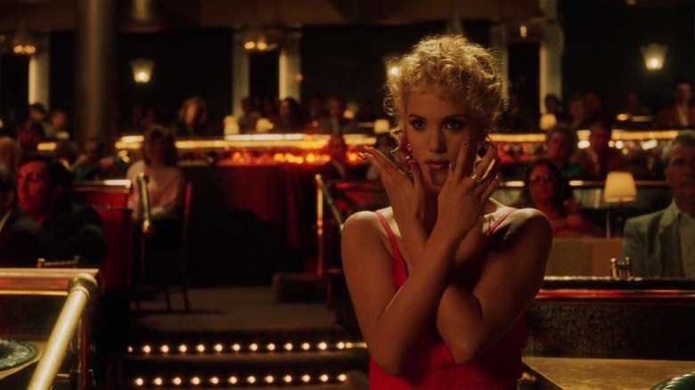 Elizabeth Berkley in her iconic Showgirls dance pose