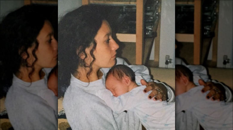 Ella Purnell as a baby with her mother