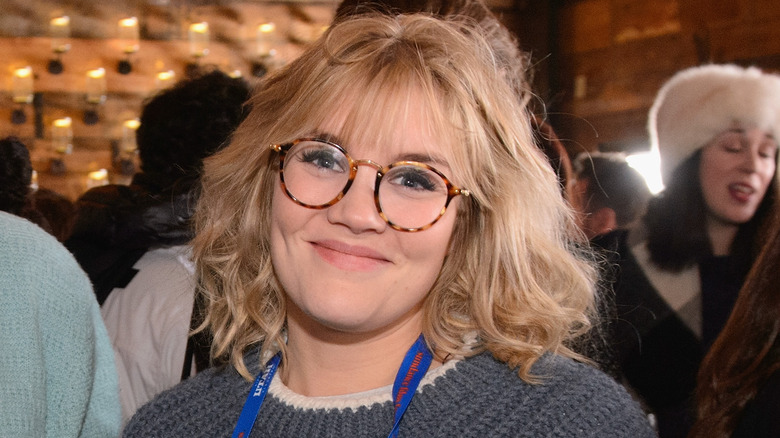 Emerald Fennell wearing glasses