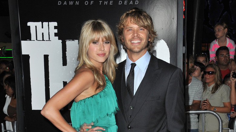 Sarah Wright Olsen and Eric Christian Olsen smiling