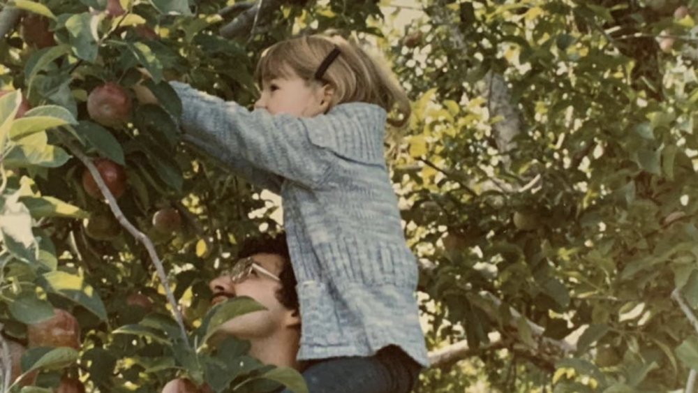 Erin Andrews as a kid on her dad's shoulders