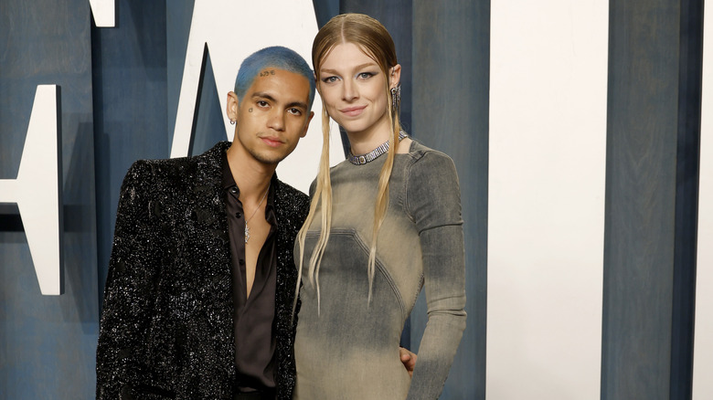 Hunter Schafer and Dominic Fike posing on the red carpet