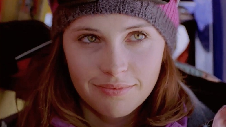 Felicity Jones in a hat and jacket in "Chalet Girl" (2011)