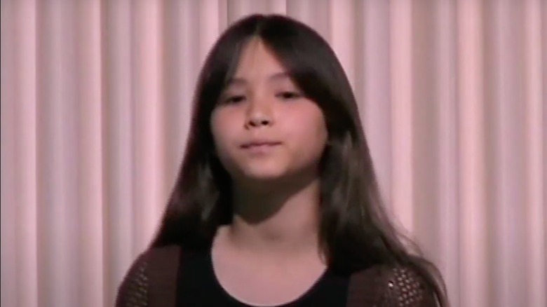 Nine-year-old Fivel Stewart posing at a recital