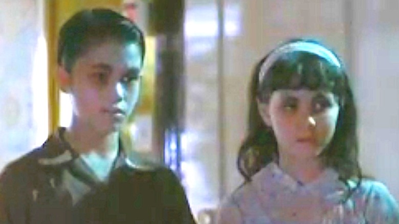 Booboo and Fivel Stewart standing together in a scene from Dante's Cove