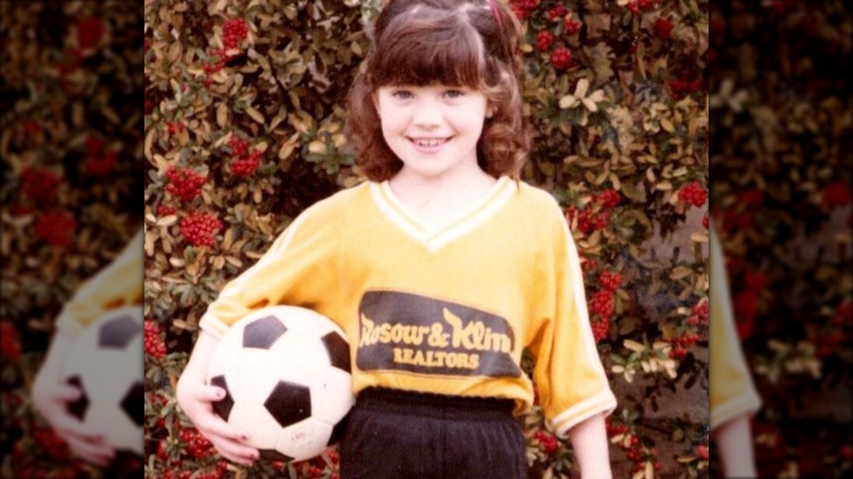 Young Norah O'Donnell with soccer ball