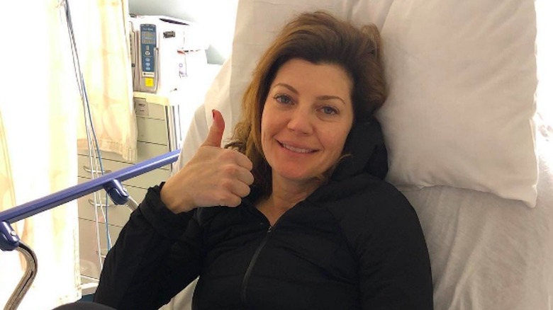 Norah O'Donnell in a hospital bed