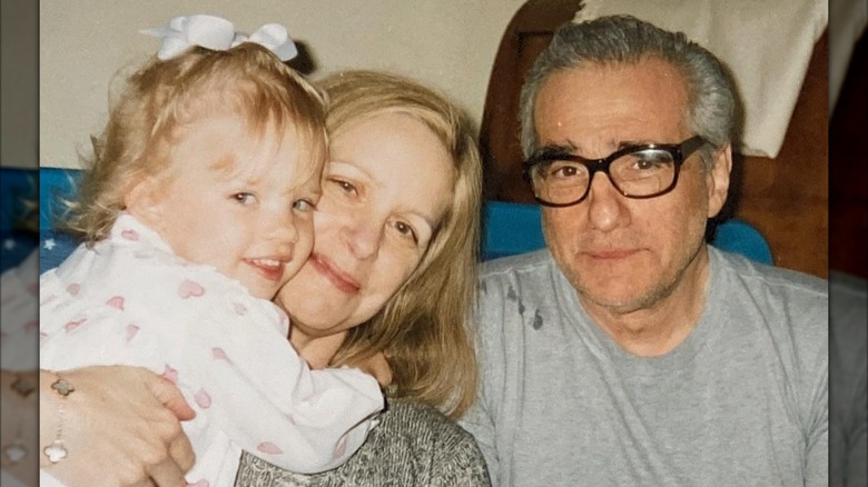 young Francesca Scorsese smiling with her parents Helen Morris and Martin Scorsese