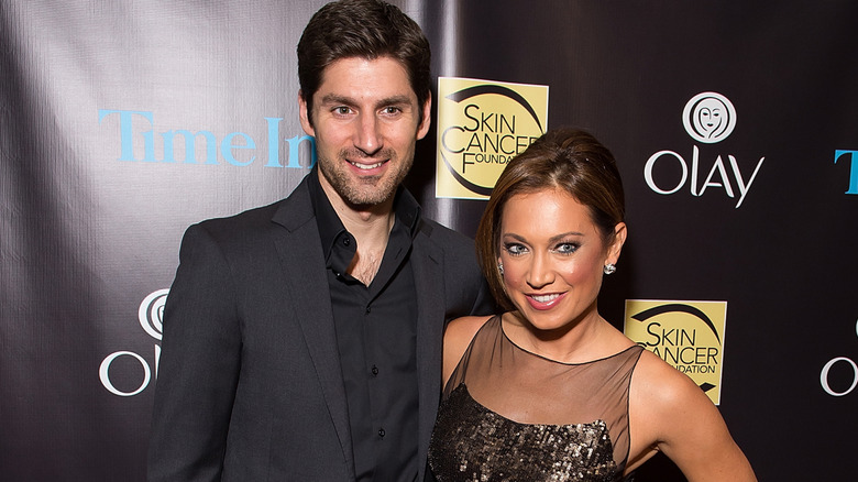 Ben Aaron and Ginger Zee posing at an event