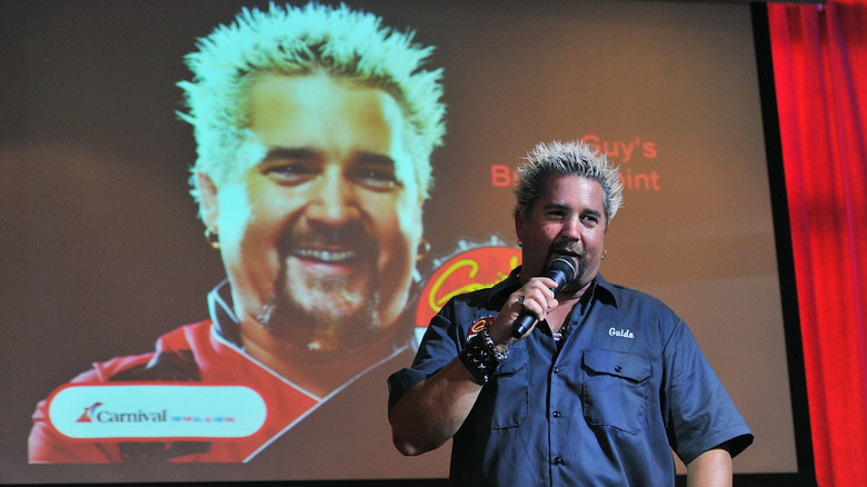 Guy Fieri giving a lecture