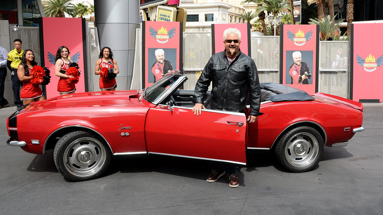 Guy Fieri with his Camaro