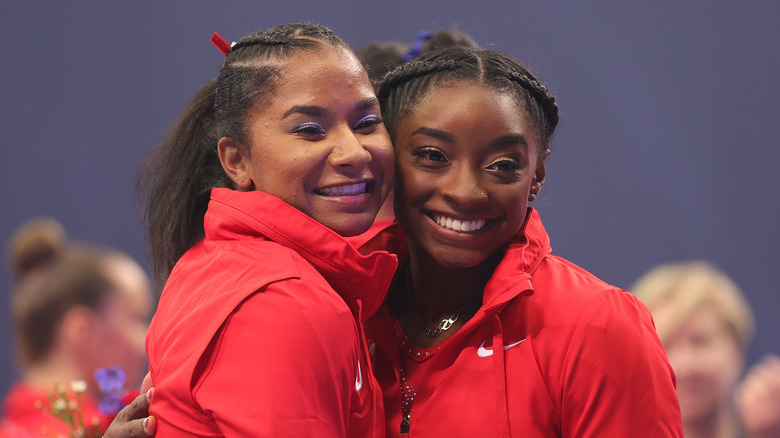 Jordan Chiles smiles with Simone Biles 