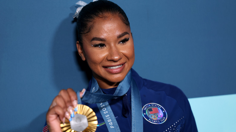 Jordan Chiles poses with medal 