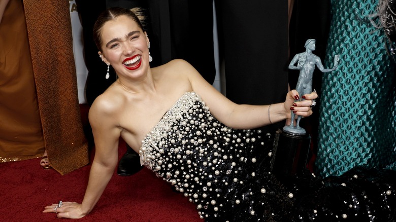 Haley Lu Richardson holding award 