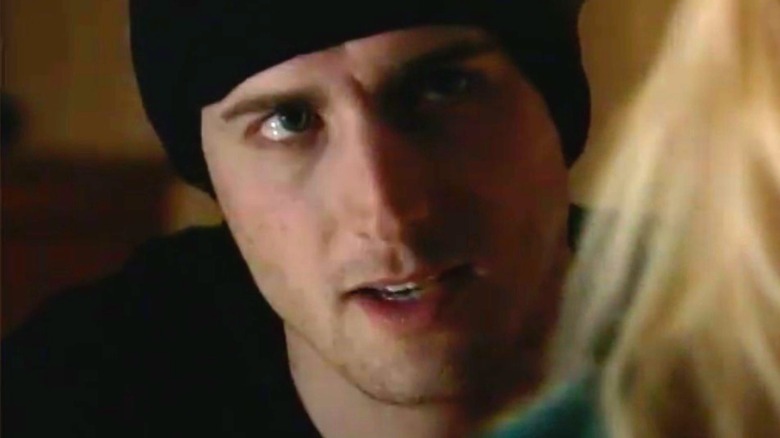 Brendan Penny wearing a hat in scene from Lifetime movie Held Hostage