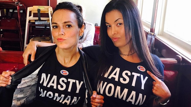 Erin Cahill and a friend in Nasty Woman shirts