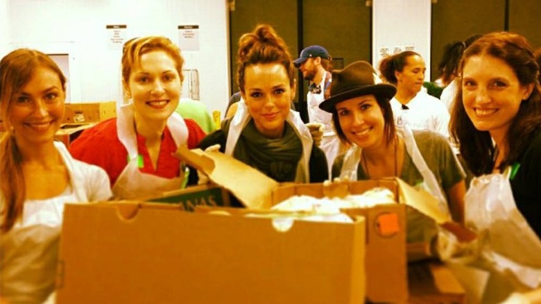 Erin Cahill and friends working at a food bank