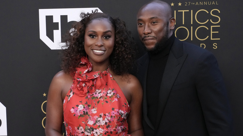 Issa Rae and Louis Diame standing together at the Critic's Choice Awards