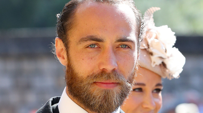 James Middleton looking at camera