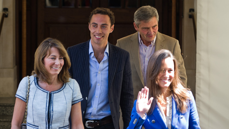 James Middleton walking with family