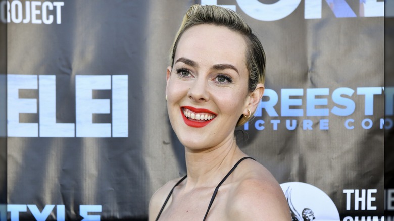 Jena Malone smiling at premiere