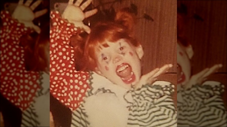 Jessica Chastain as a child dressed as a clown