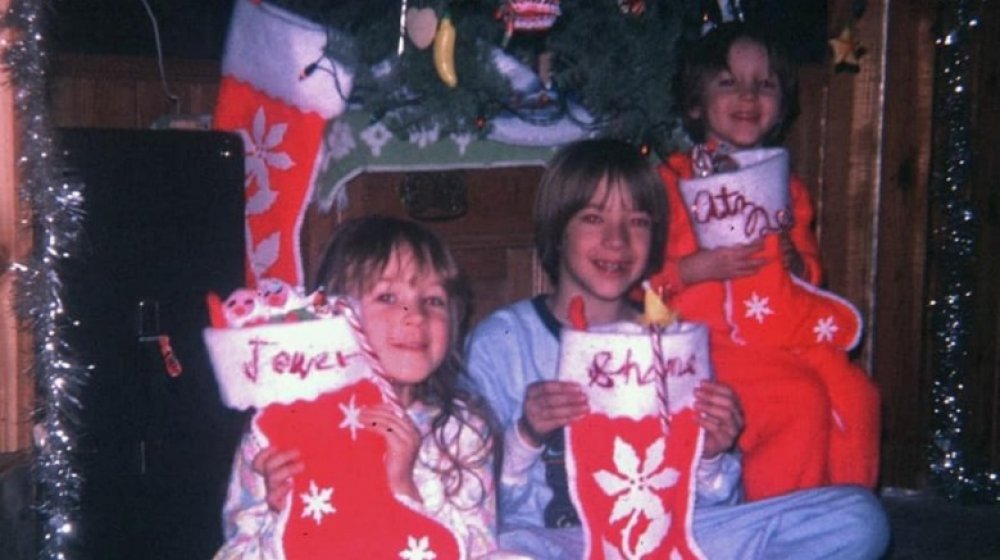 Jewel as a young girl with her siblings at Christmas