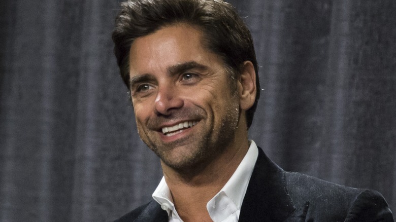 John Stamos smiling