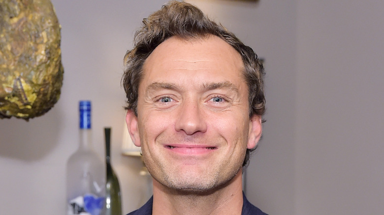 Jude Law posing, smiling