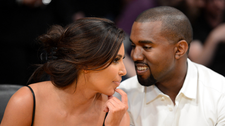 Kanye West smiling at Kim Kardashian