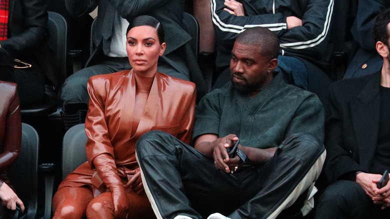 Kim Kardashian, Kanye West sitting