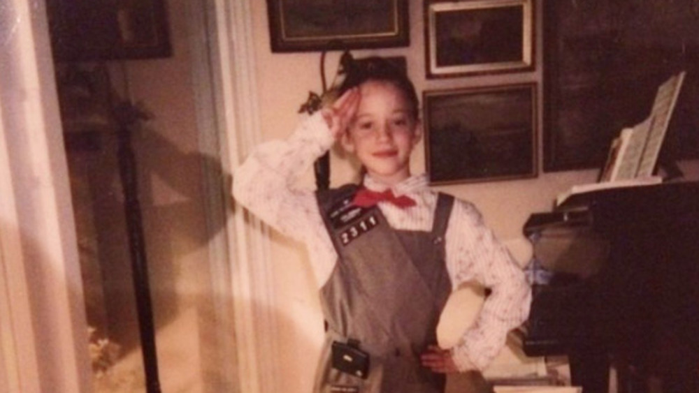 Young Kat Dennings in girl scouts