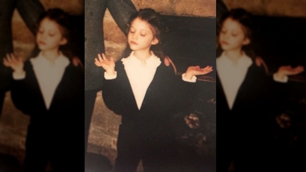 Kat Dennings as a child