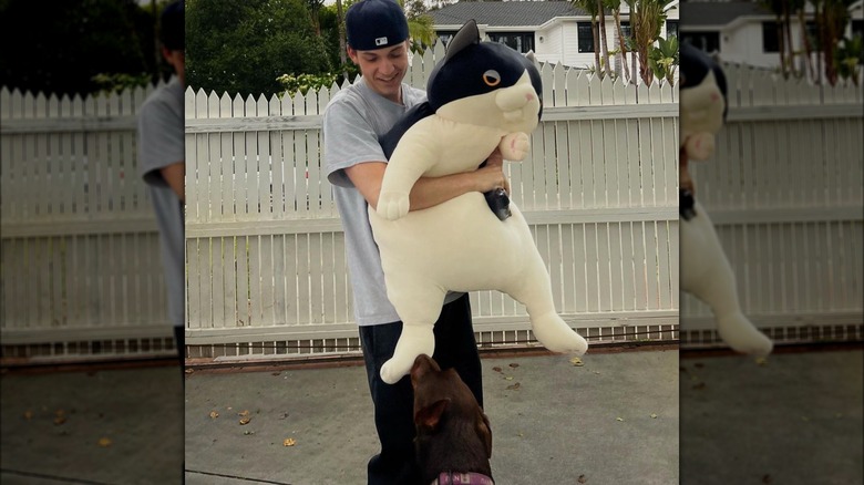 Ryder Robinson holding stuffed toy