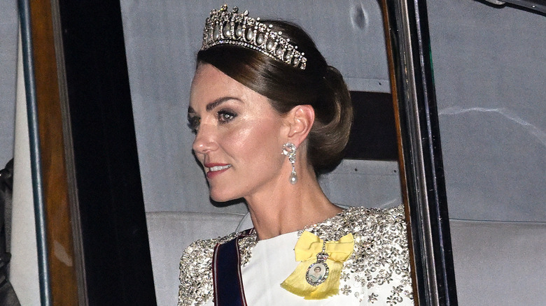 Princess Catherine in car wearing tiara and sash