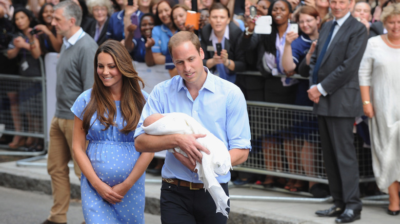 Princess Catherine and Prince William with baby George