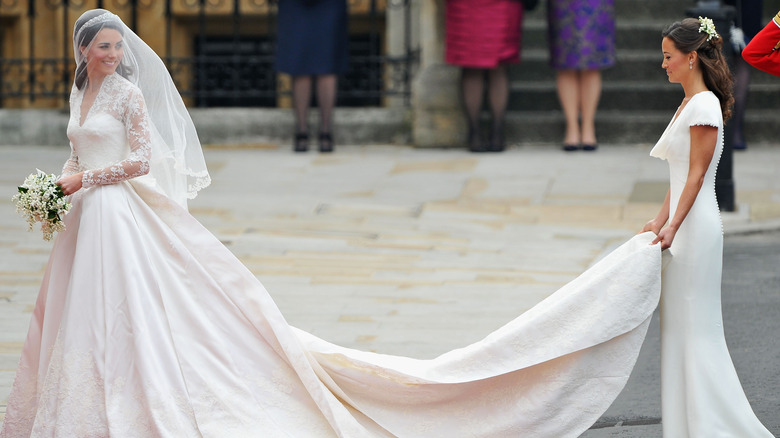 Princess Catherine in wedding gown outside Westminster Abbey