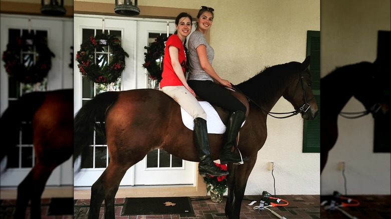 Kate Upton and woman on horseback