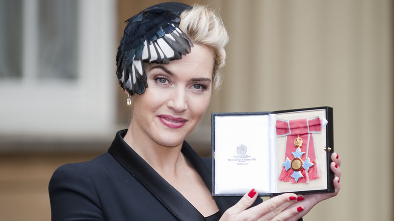 Kate Winslet Holding Her CBE